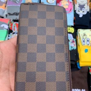 Louis Vuitton wrist bag. Like new.